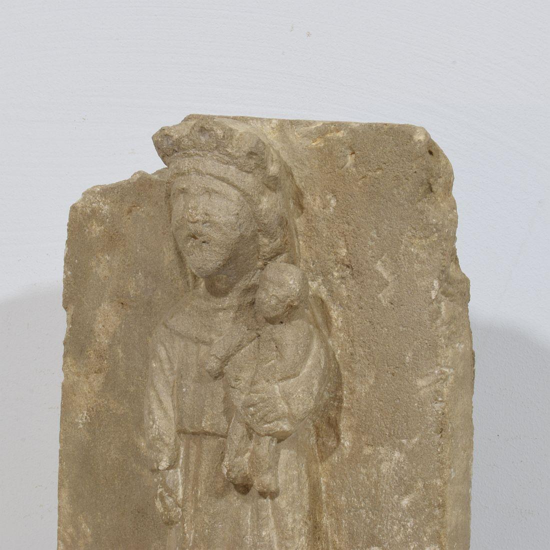 French Medieval Carved Stone Panel Depicting A Madonna With Child For Sale 4