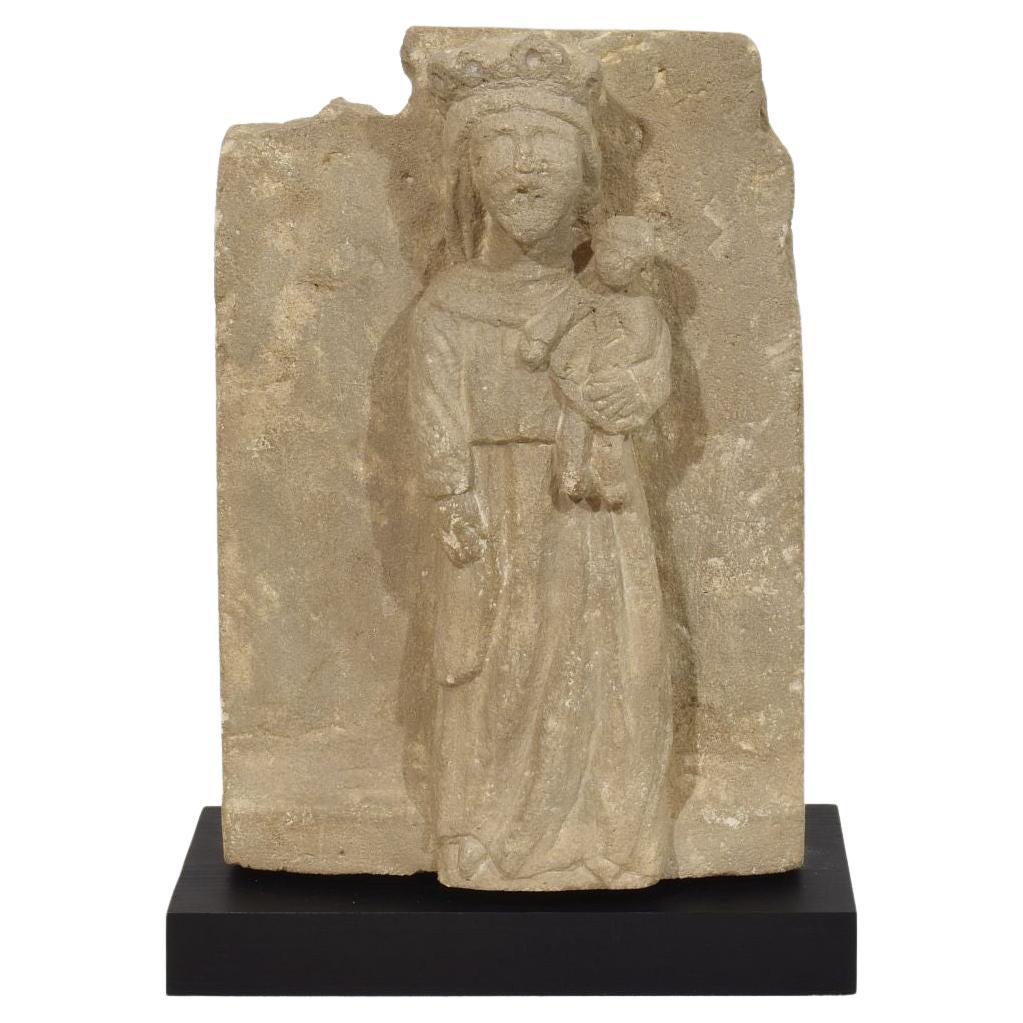 French Medieval Carved Stone Panel Depicting A Madonna With Child For Sale
