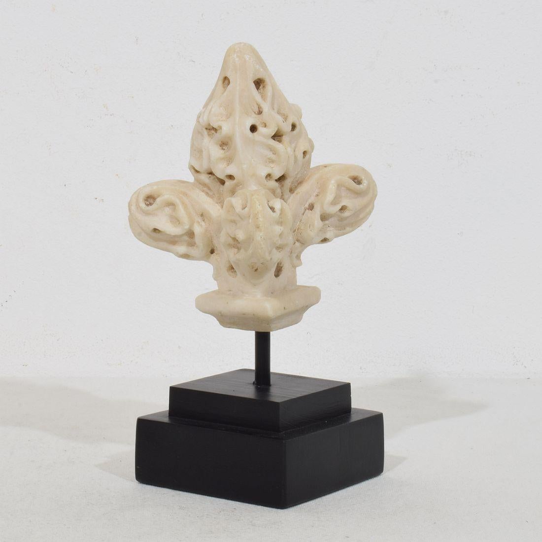 Unique hand carved alabaster fragment/ finial that once adorned the interior of a Gothic French Church or Chapel. 
France, circa 1250-1450,
Despite of its high age in a good condition
Measurement includes the wooden base.
H:17cm  W:7cm D:7cm 