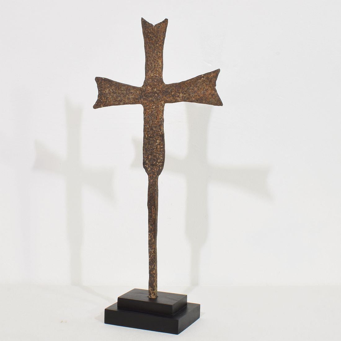 Unique hand forged iron cross that once stood in the centre of a Provençal village.
France, circa 1450-1550. Weathered.
Measurement is with the wooden base.