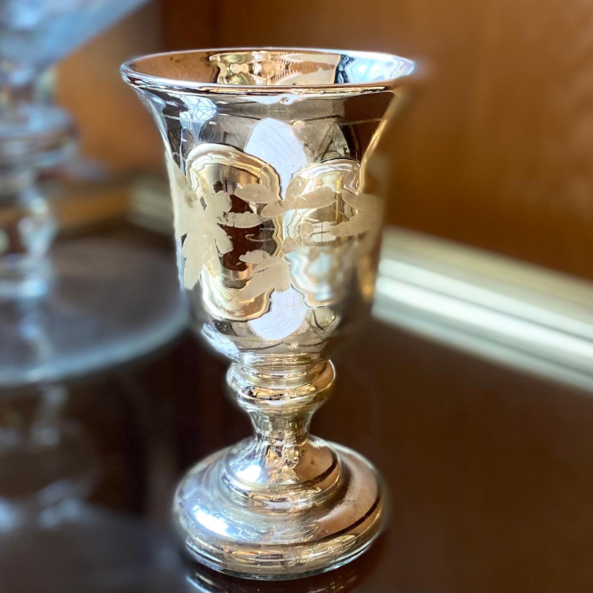 A circa 1920s French etched and mercury glass cup with foliage details.

Measurements:
Height: 6.5?
Diameter at widest: 3.75?.