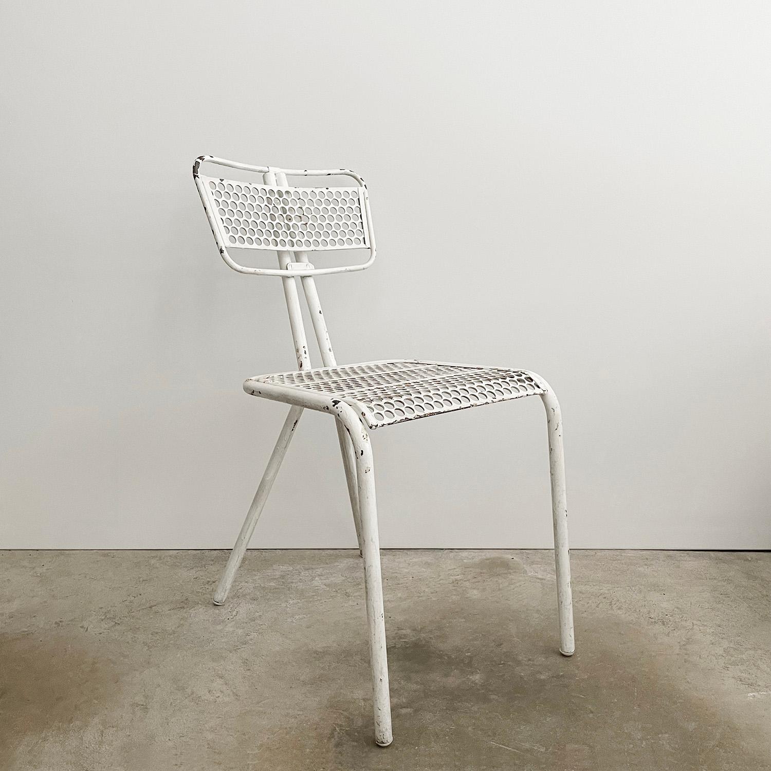 René Malaval for Bloc Metal 
France, post war 
This vintage metal side chair will add wonderful texture and rich history to any room
Composed of perforated metal backrests/seats 
Tubular steel legs 
Surprisingly comfortable
Unique architectural