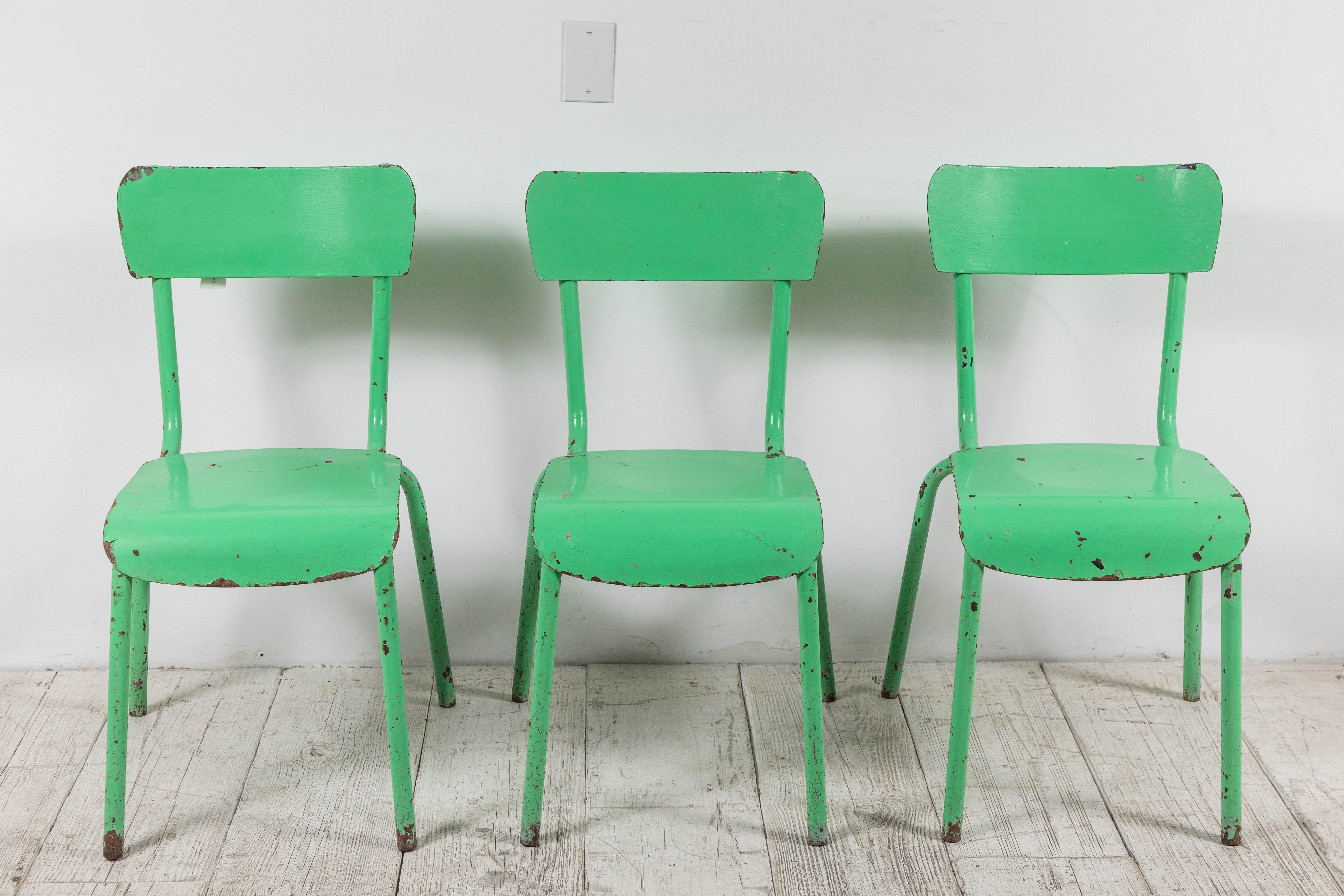 French metal green painted chairs.