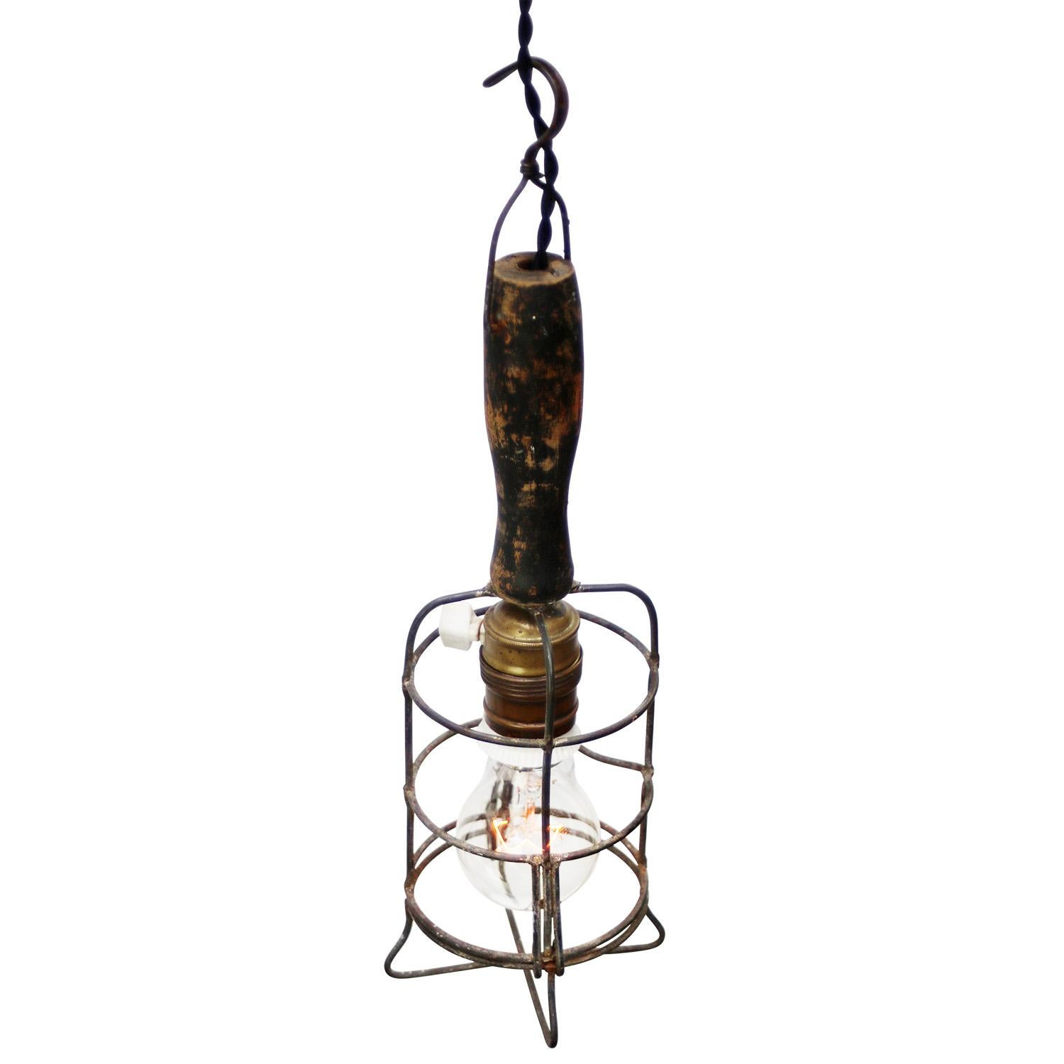French Work light, wooden handle, brass and iron cage
Work light, wooden handle, black cotton wire

E26 / E27

Weight: 0.40 kg / 0.9 lb

Priced per individual item. All lamps have been made suitable by international standards for incandescent light