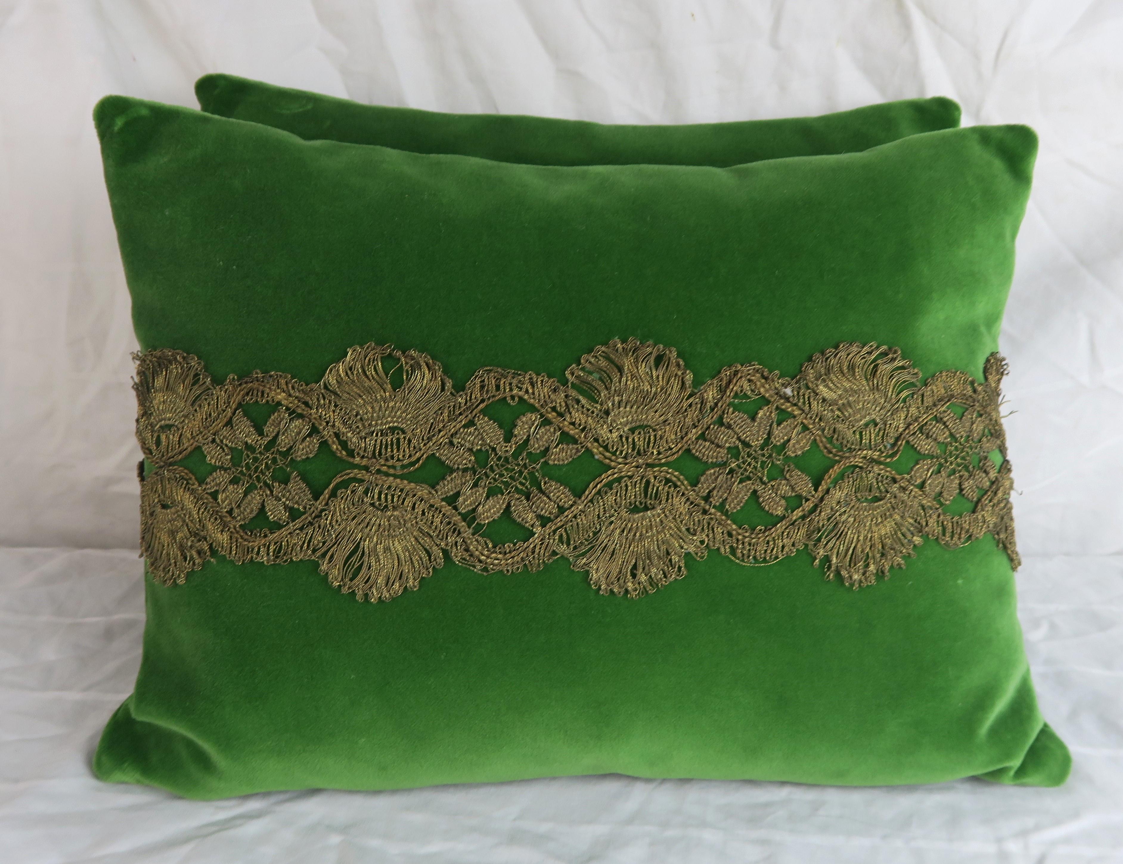 Pair of French metallic lace appliqued green silk velvet pillows. Down inserts, zipper closures.