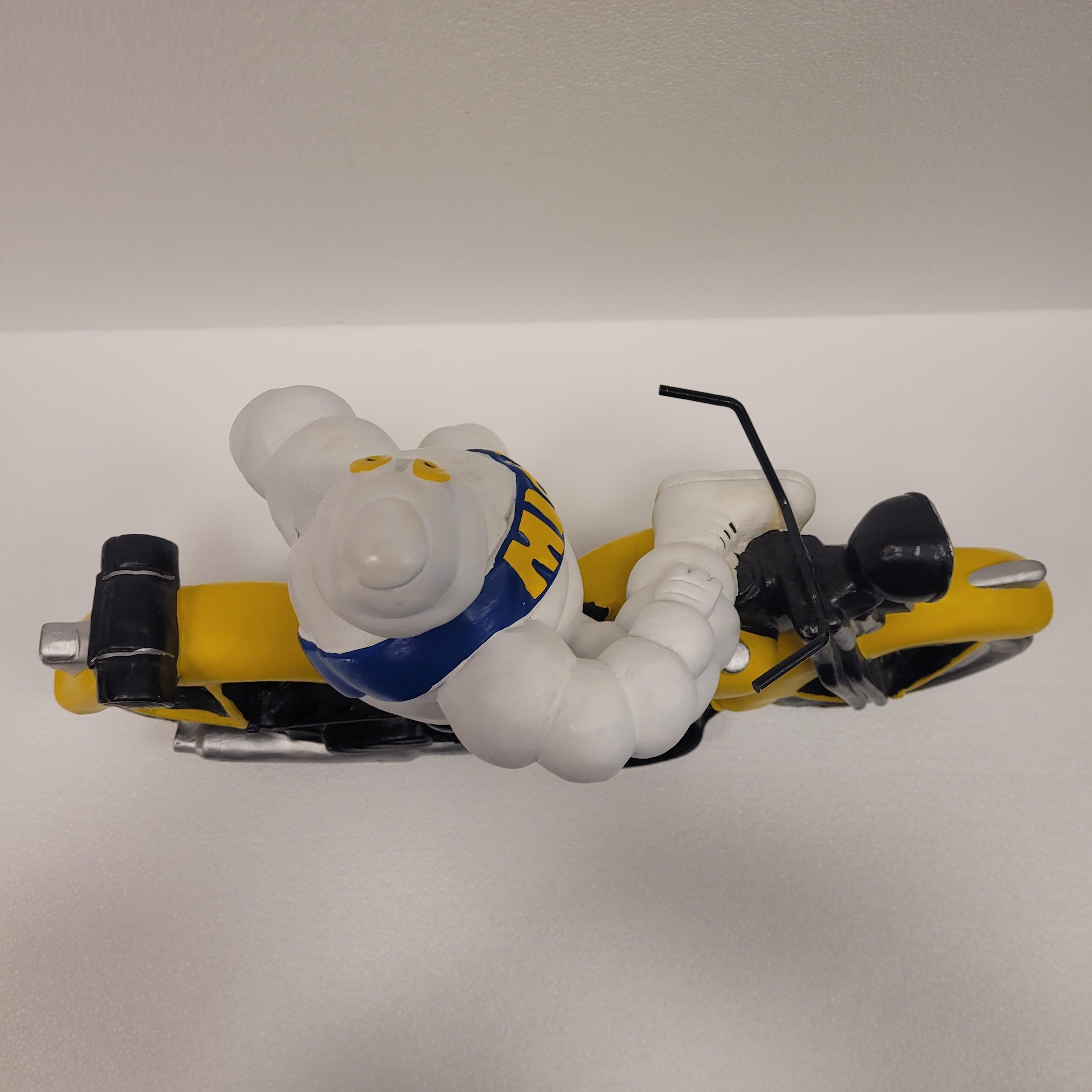 French Michelin Doll or Bibendum with motorcycle , resin 1