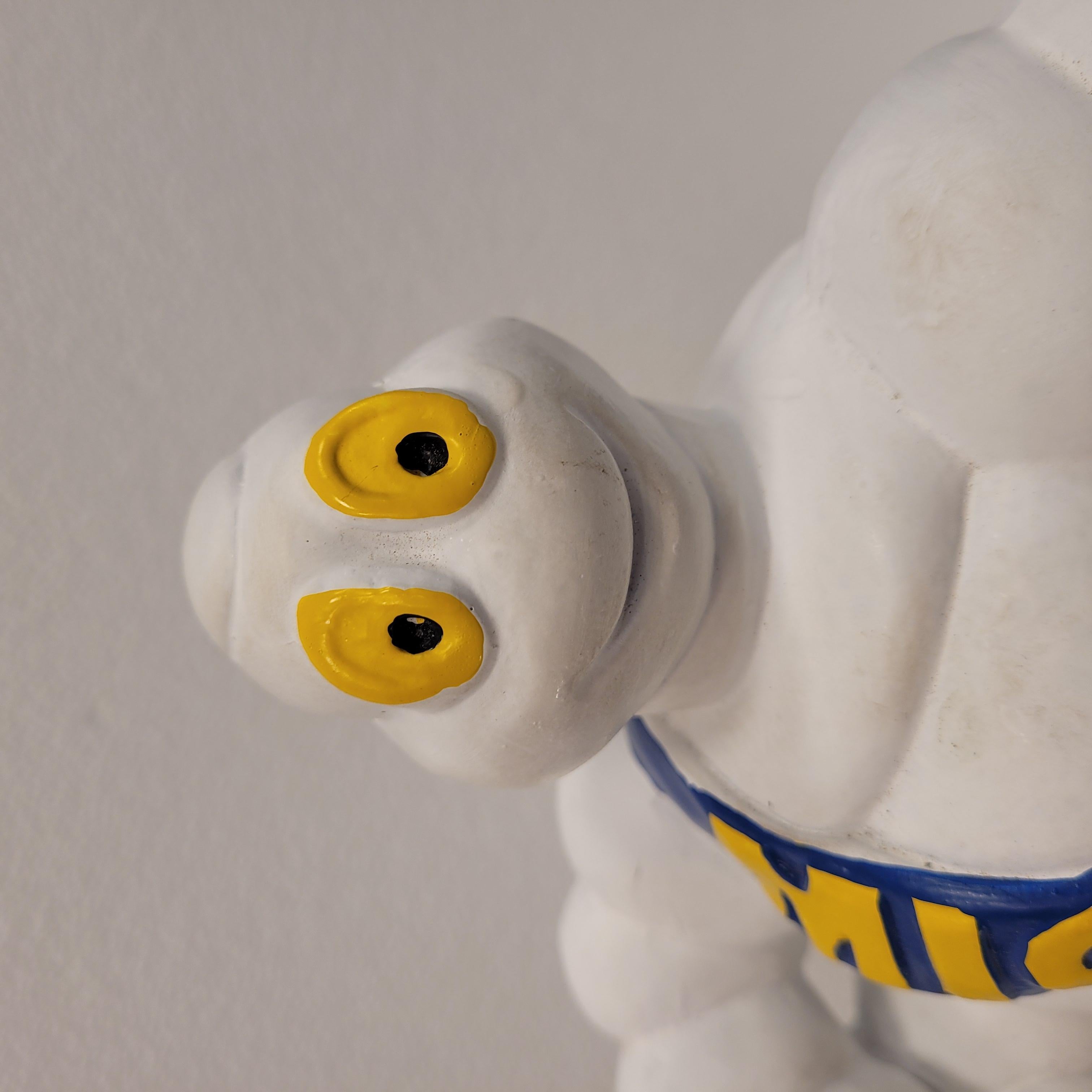 French Michelin Doll or Bibendum with motorcycle , resin 4