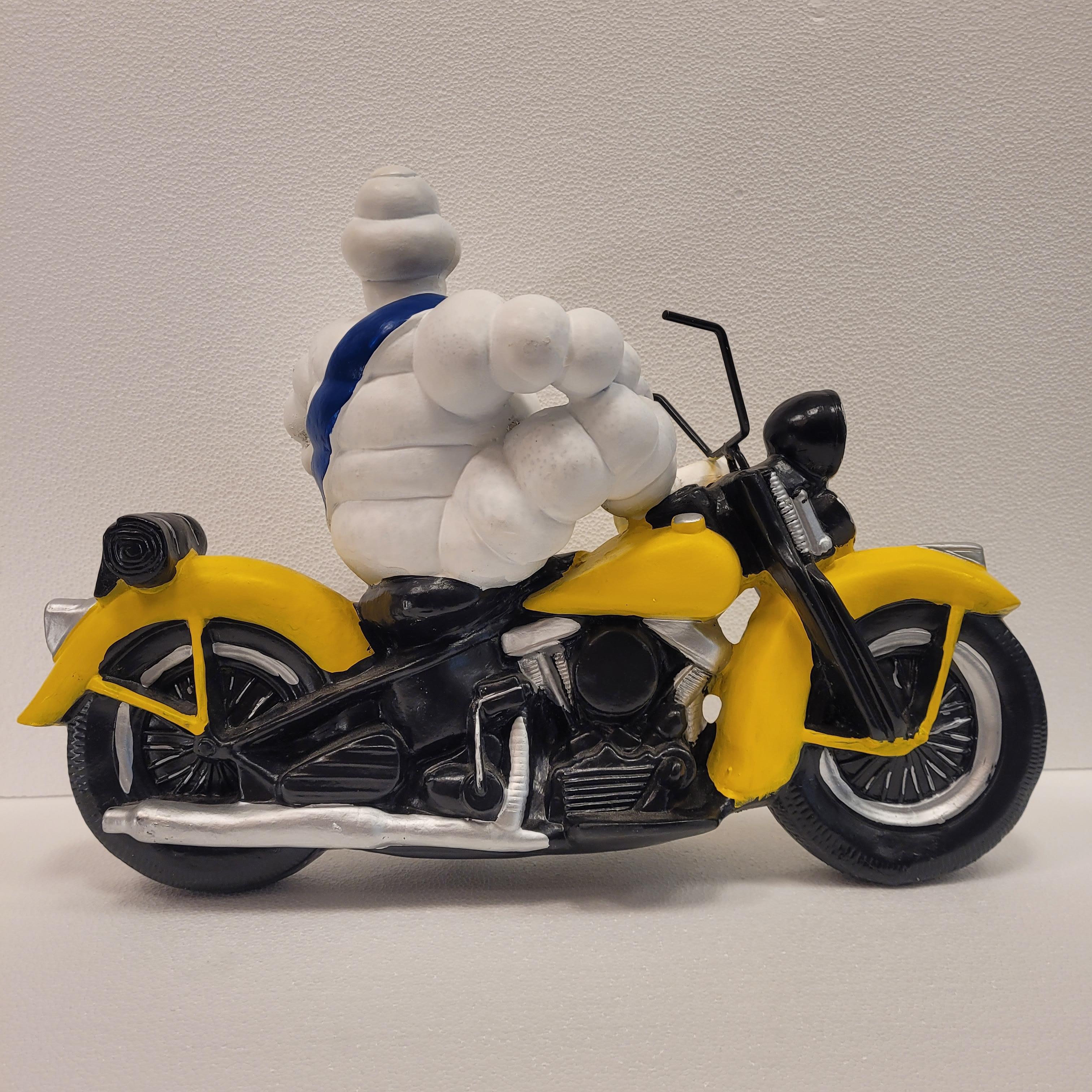 French Michelin Doll or Bibendum with motorcycle , resin 11