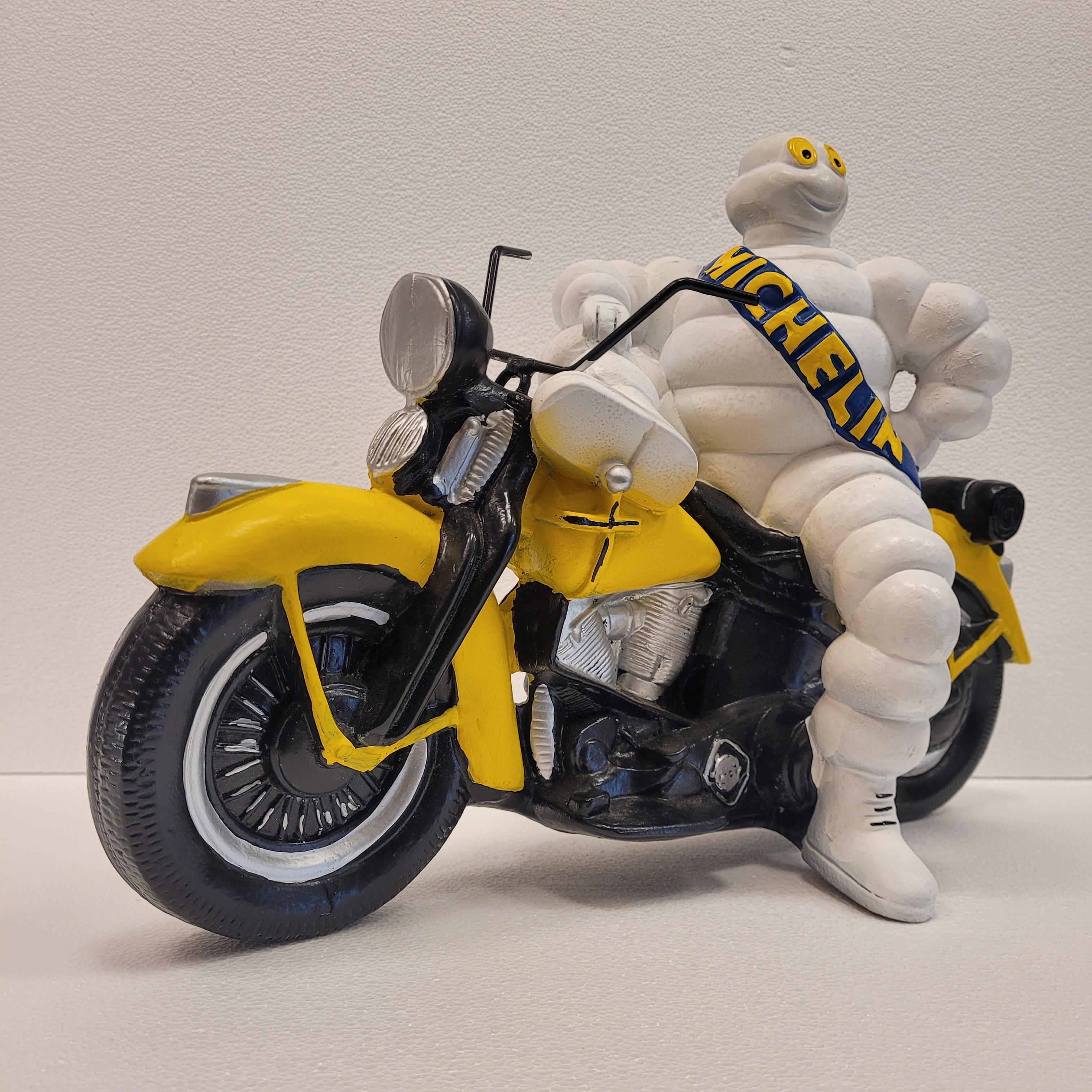 Hand-Crafted French Michelin Doll or Bibendum with motorcycle , resin