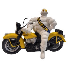 Used French Michelin Doll with motorcycle Marius Rossillon  resin 