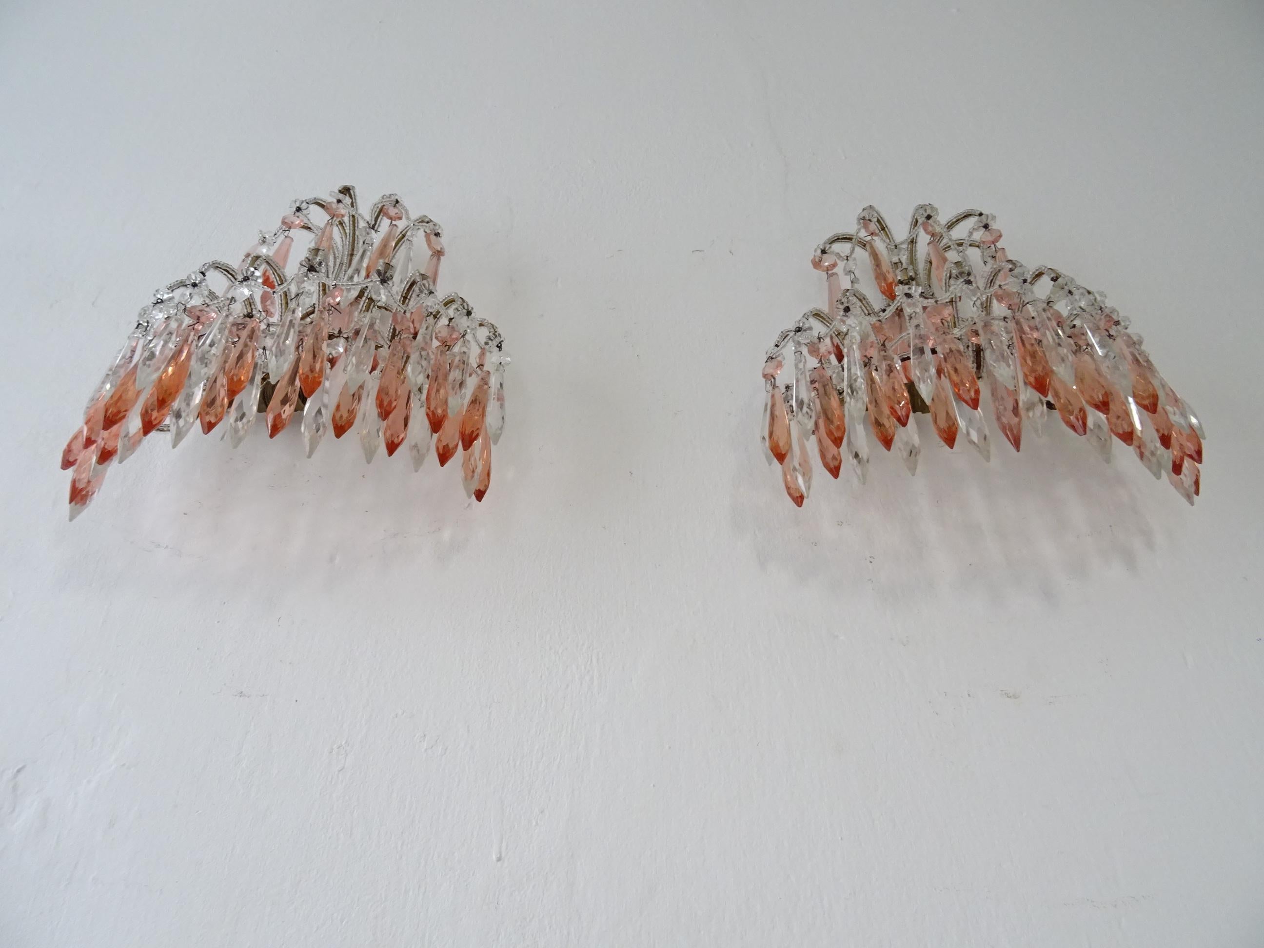 Housing one light each. Will be rewired with certified UL US sockets for the United States and appropriate certified sockets for other countries and ready to hang. Extremely rare pair. Completely beaded with crystal spears in peachy pink and clear.
