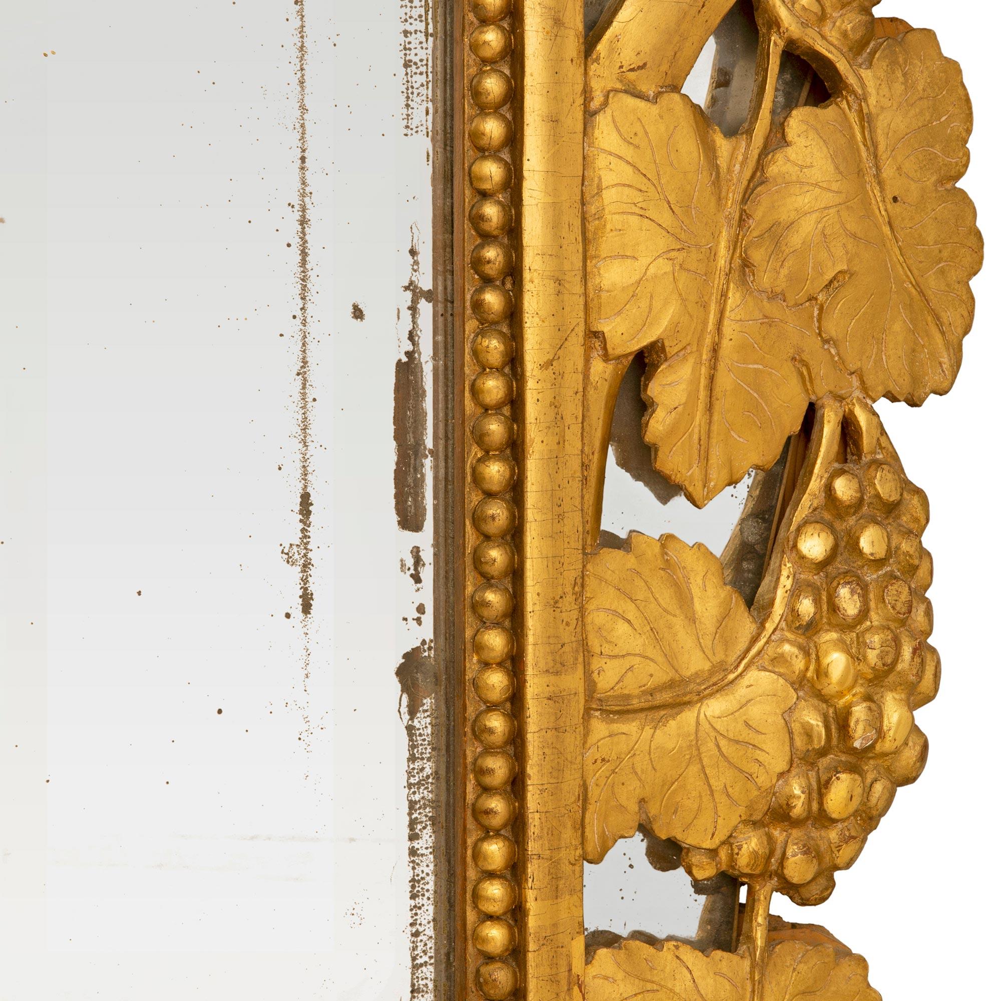 French Mid-18th Century Provincial Giltwood Mirror For Sale 1