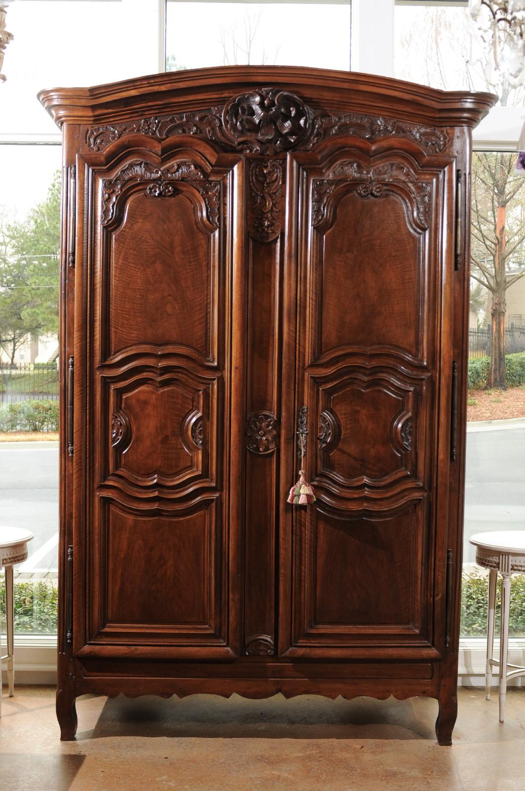 18th Century and Earlier French Mid-18th Century Walnut Louis XV Lyonnaise Armoire with Carved Shell