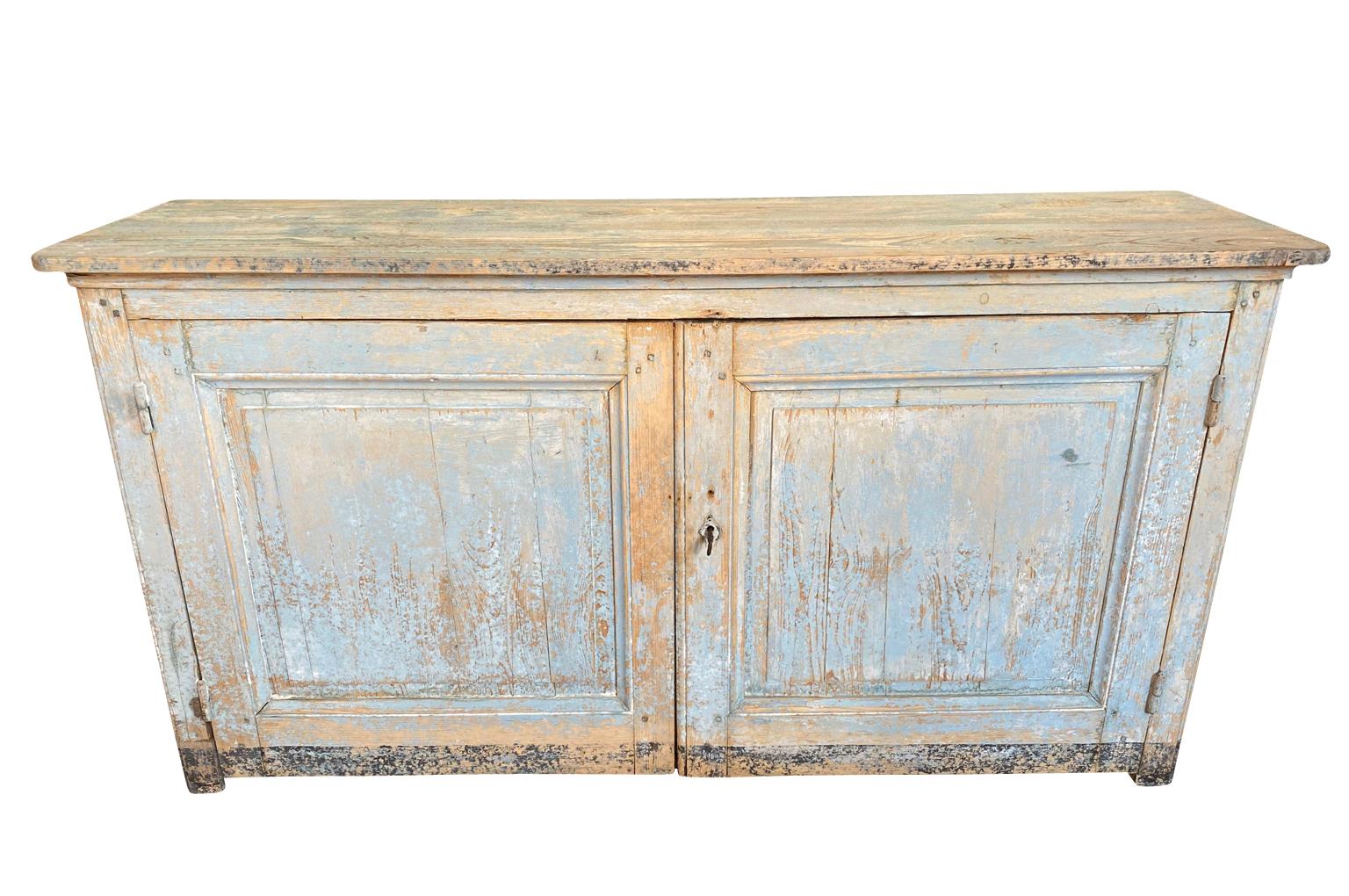 A very charming later mid-19th century 2 door buffet from the Provence region of France. Wonderfully constructed from painted wood - beautiful patina and finish.