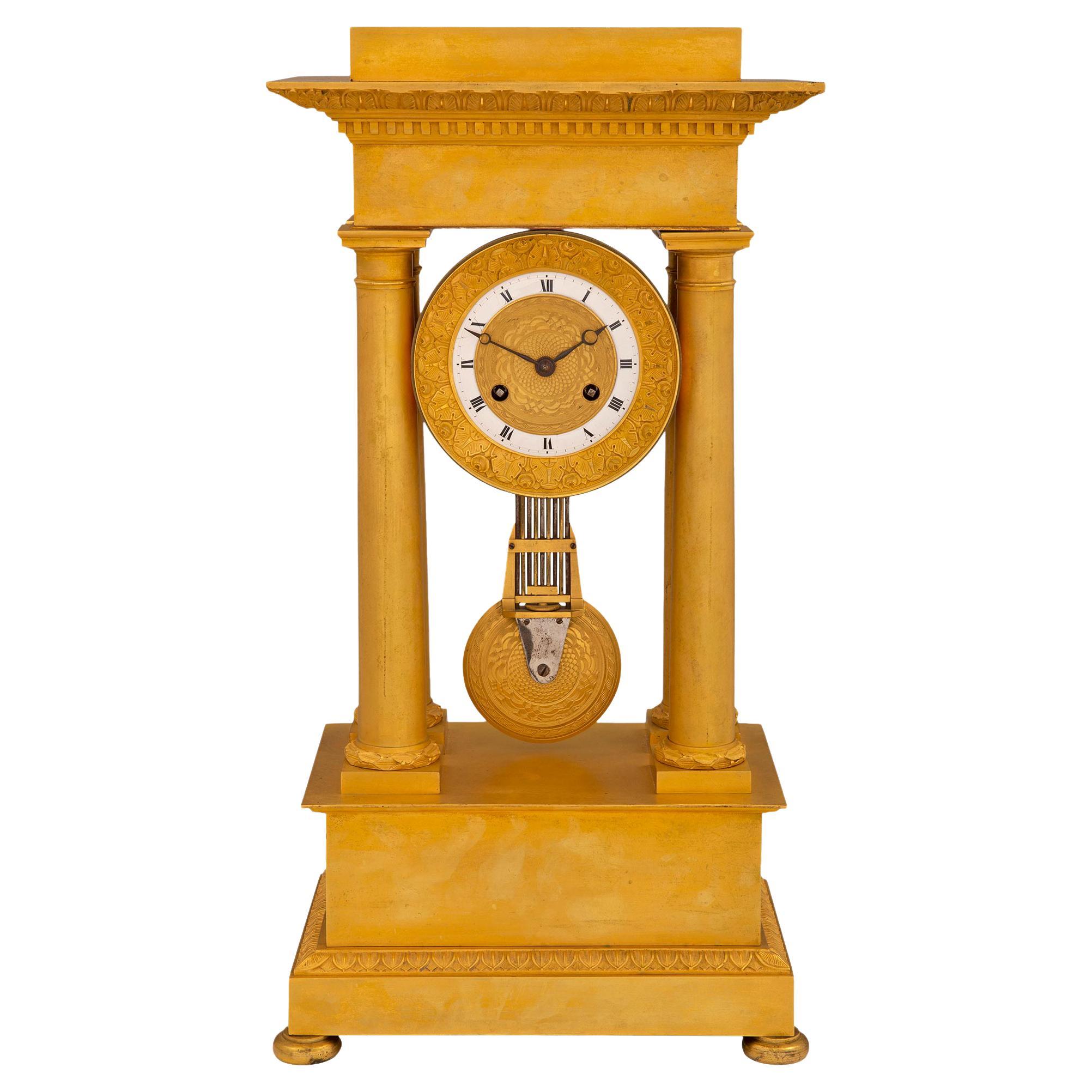 French Mid 19th Century Charles X Period Ormolu Portico Clock For Sale