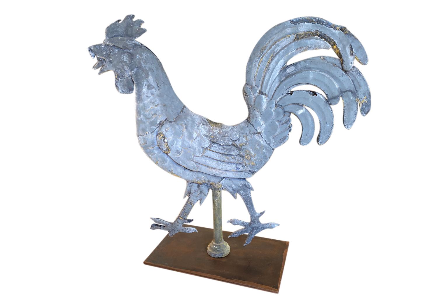 A very handsome mid-19th century Coq - Rooster from the South of France. Beautifully crafted in zinc with fabulous patina. Now resting on its iron base. A terrific accent piece.