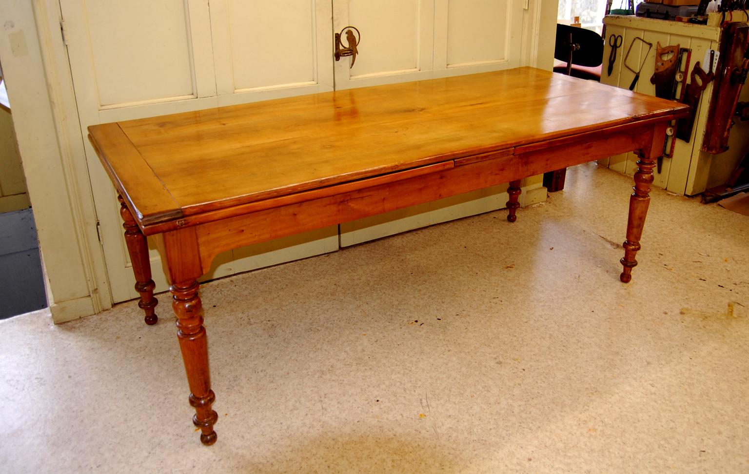 antique dining table with hidden leaves