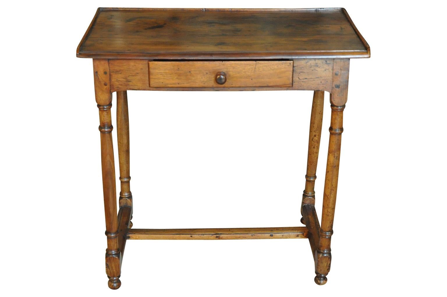 A very charming mid-19th century side table from the Provence region of France. Handsomely constructed from beautiful walnut - terrific patina - warm and luminous.