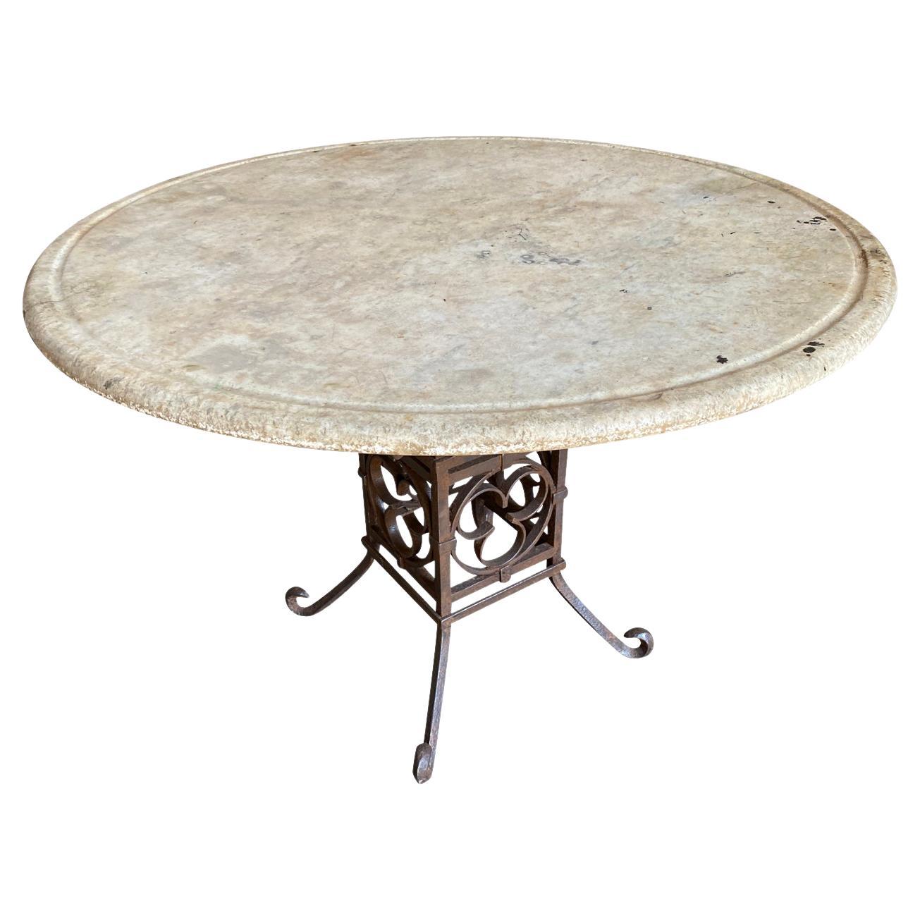 A stunning mid-19th century Garden Gueridon from the Provence region of France. Beautifully crafted with a wonderful marble top and a very handsome iron base. Perfect for any interior or garden. Excellent patina.