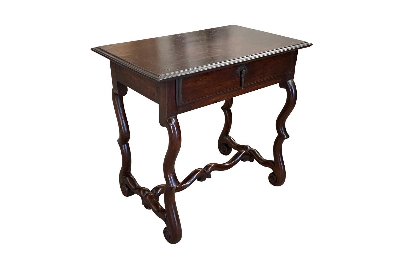 A very beautiful French mid-19th century Louis XIII style side table. Soundly constructed from beautiful walnut with a single drawer.