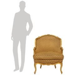 French mid 19th century Louis XV st. Giltwood Bergère armchair