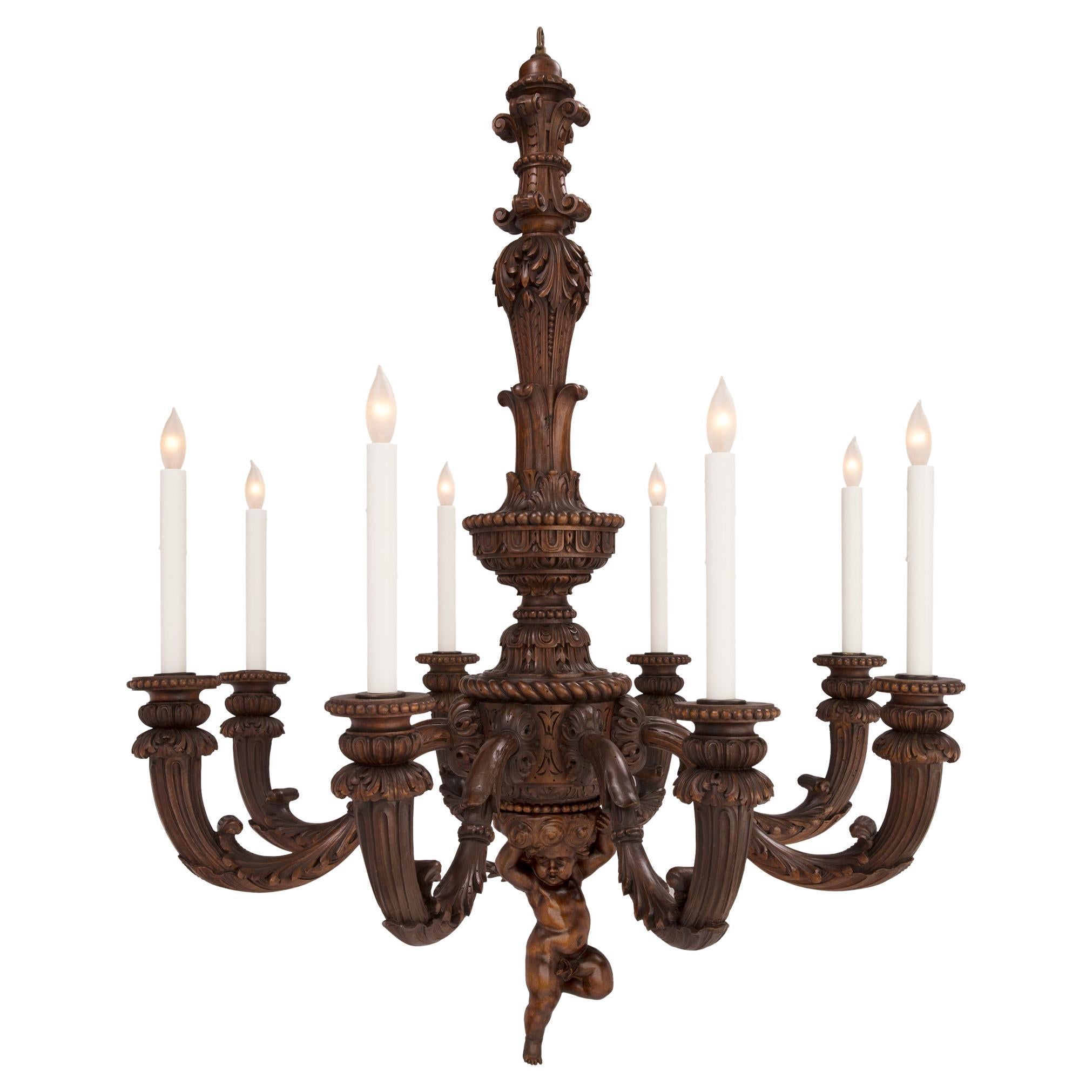 French Mid-19th Century Louis XVI St. Oak Eight-Arm Chandelier For Sale