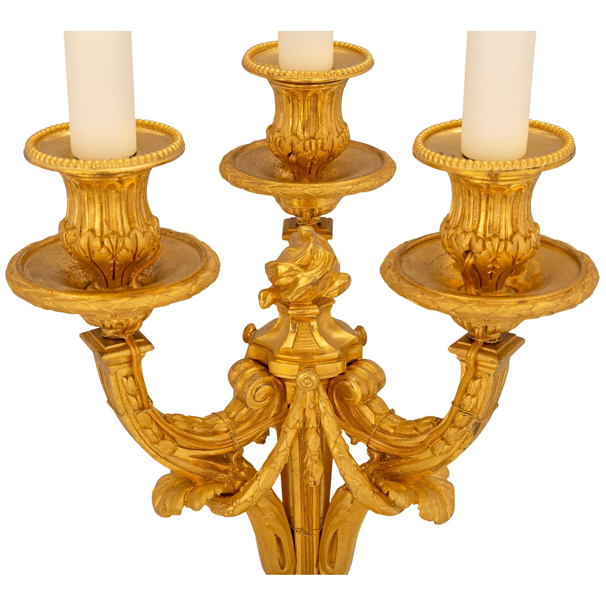French Mid-19th Century Louis XVI St. Ormolu Three-Light Candelabra Lamps In Good Condition For Sale In West Palm Beach, FL