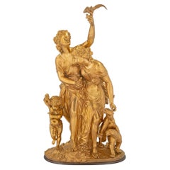 Statue française du milieu du XIXe siècle de style Louis XVI en bronze et bronze doré, signée Delesalle