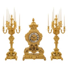 French Mid-19th Century Ormolu Three-Piece Garniture Clock Set