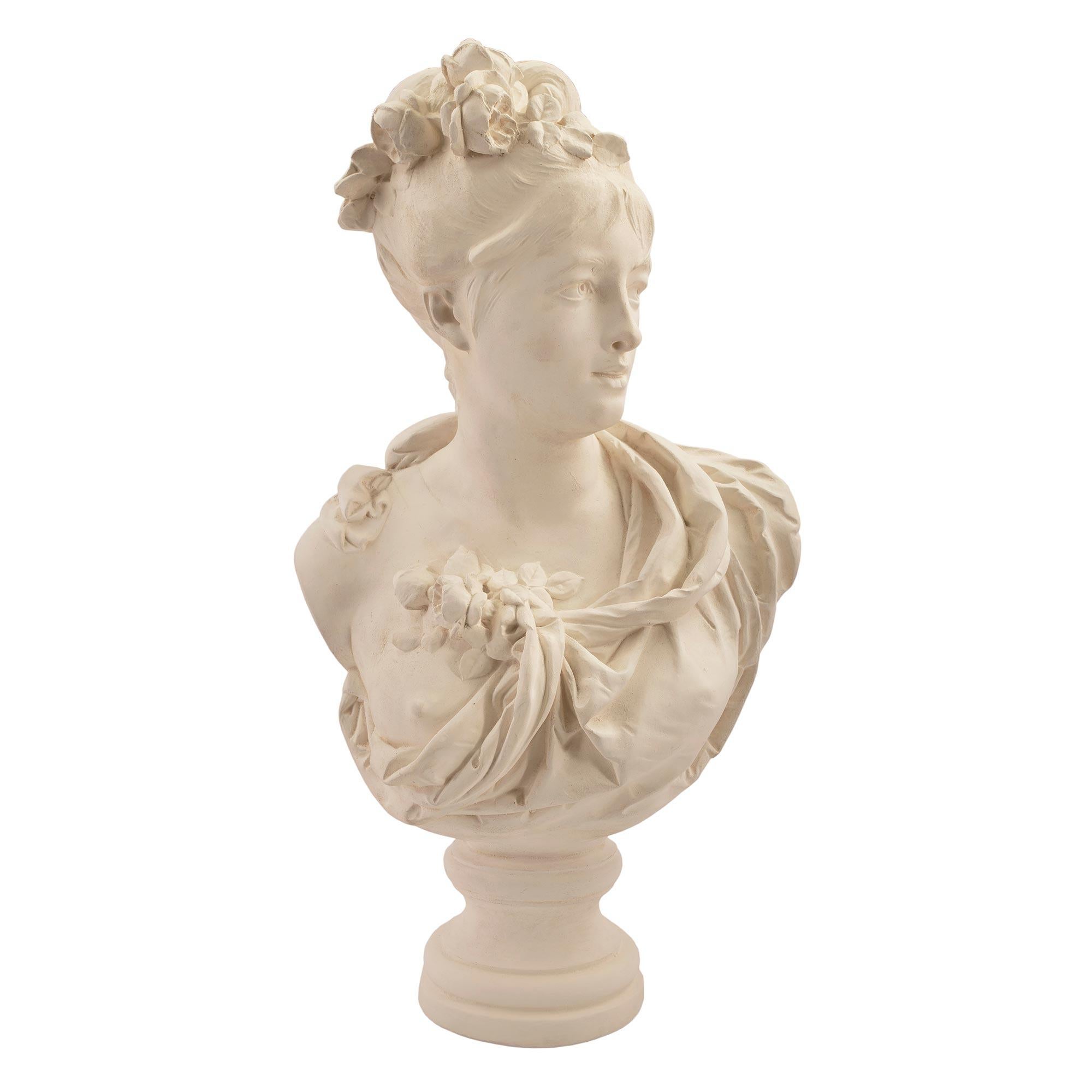 French Mid-19th Century Plaster Bust of a Young Lady For Sale