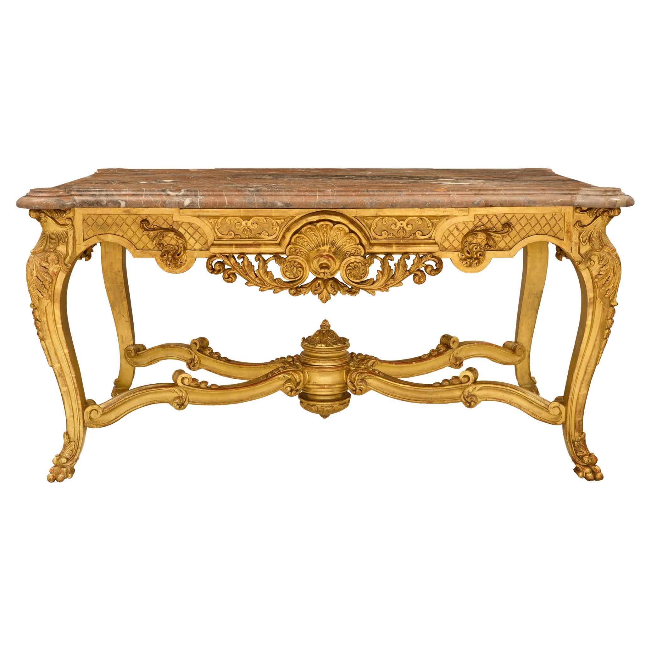 French Mid-19th Century Régence St. Giltwood and Marble Center Table For Sale