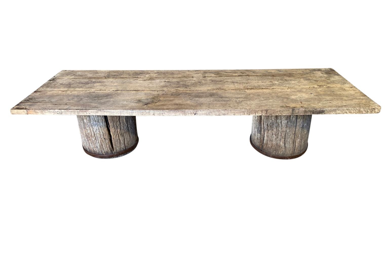 A terrific mid-19th century table basse - coffee table from the South of France. Wonderfully constructed with a beautifully patina'd plateau and legs cut down from columns in naturally washed walnut. A sensational coffee table for any casual