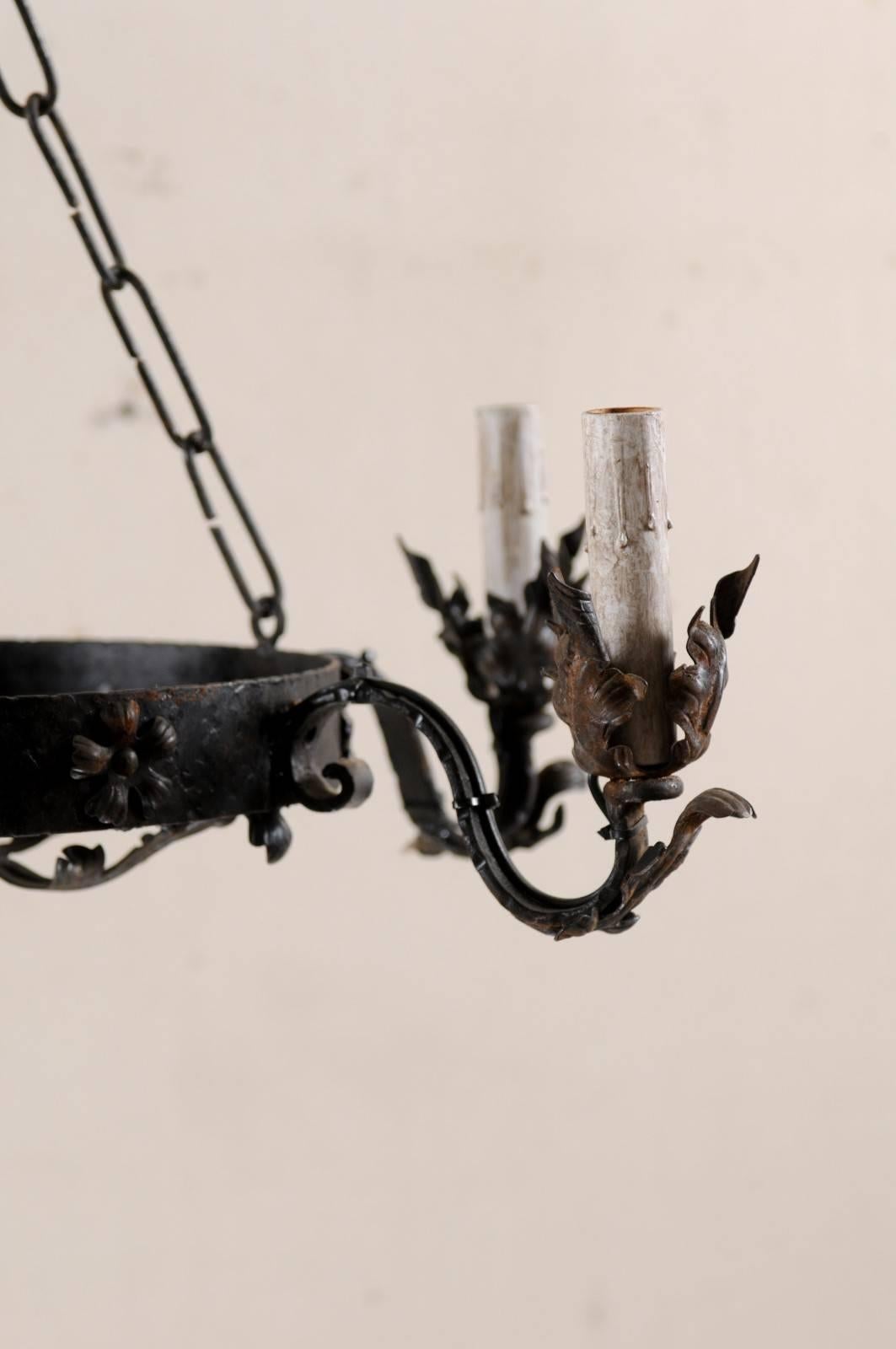 Mid-20th Century Ring Shaped Dark Iron Chandelier with Floral and Leaf Motifs In Good Condition For Sale In Atlanta, GA