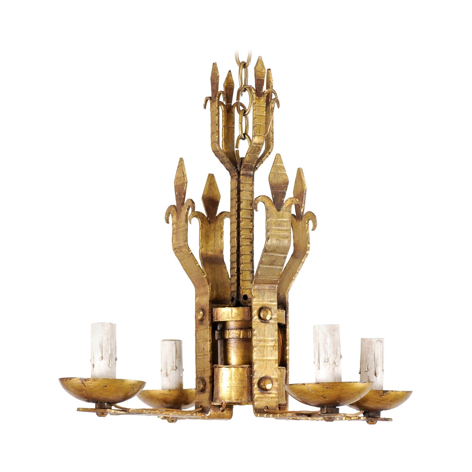 French Mid-20th Century Four-Light Gold Iron Chandelier in Fleur de Lys Motif For Sale
