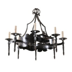 French Mid-20th Century Iron Ring Chandelier with Eight Torch-Shaped Lights