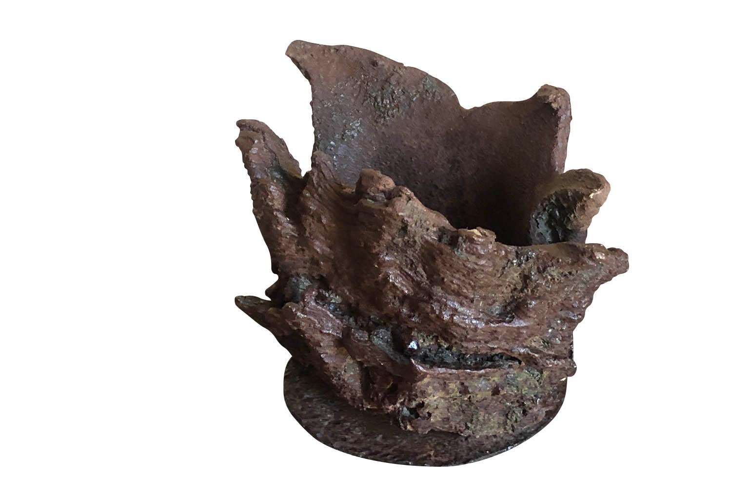 A very intriguing French mid-20th century artist sculpture in iron. A wonderful cachepot or vessel.