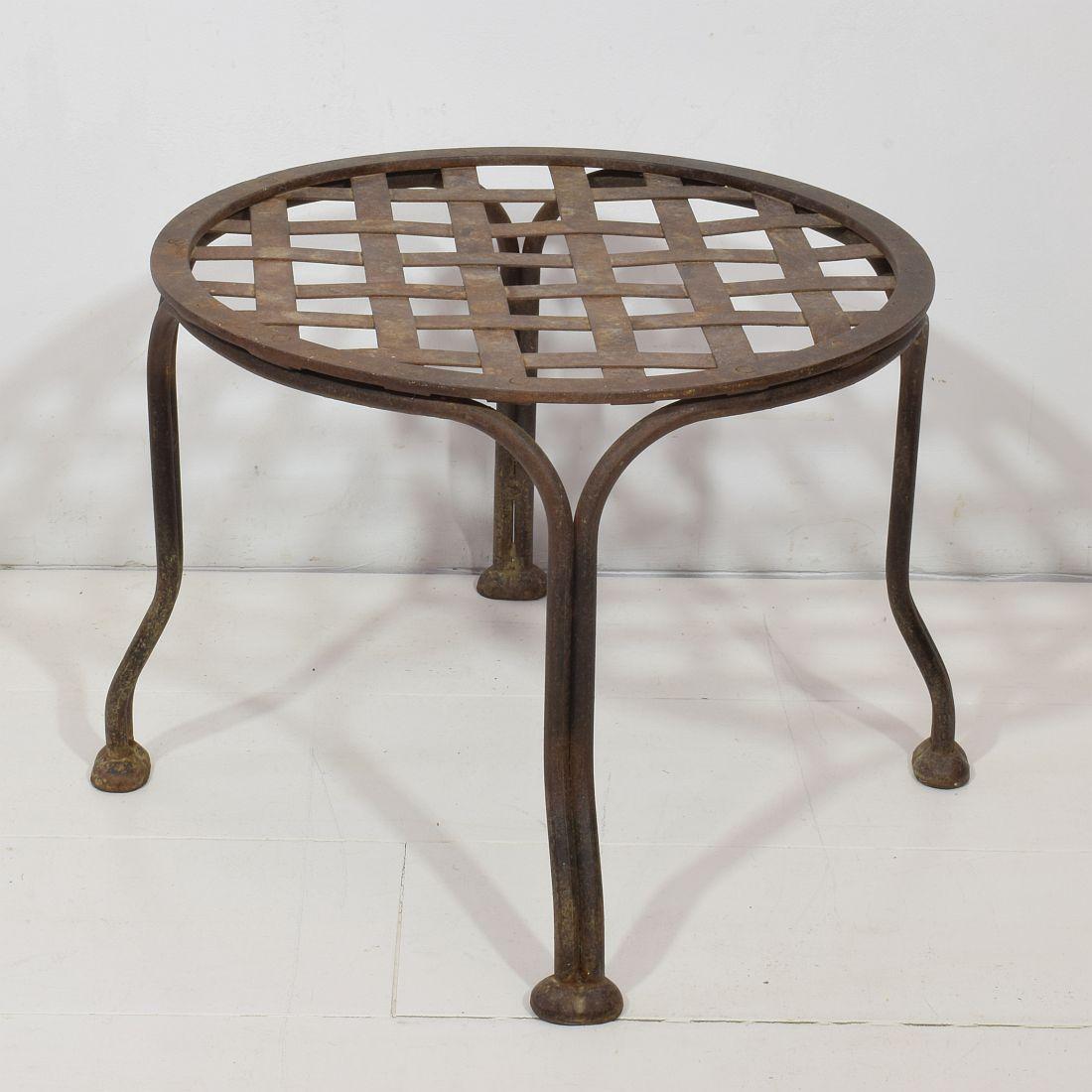 French weathered iron stool with a great robust looking patina.
France, circa 1950. Weathered but very good condition.