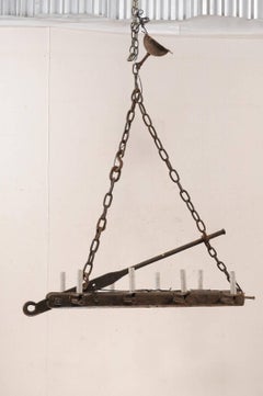 French Mid-20th Century Long Wood Beam and Iron Eight-Light Chandelier