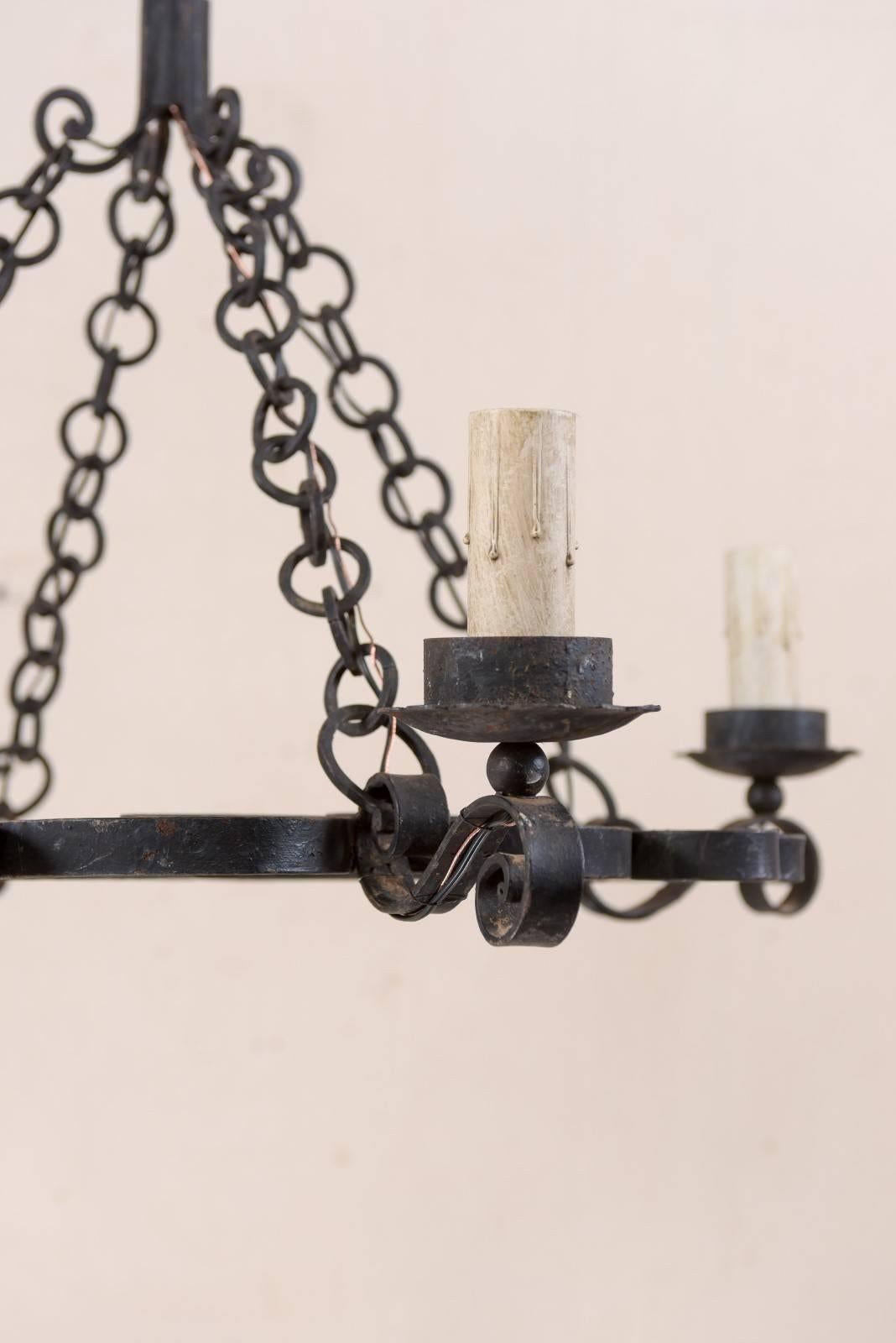 French Mid-20th Century Nicely Scrolled Four-Light Black Iron Chandelier For Sale 1