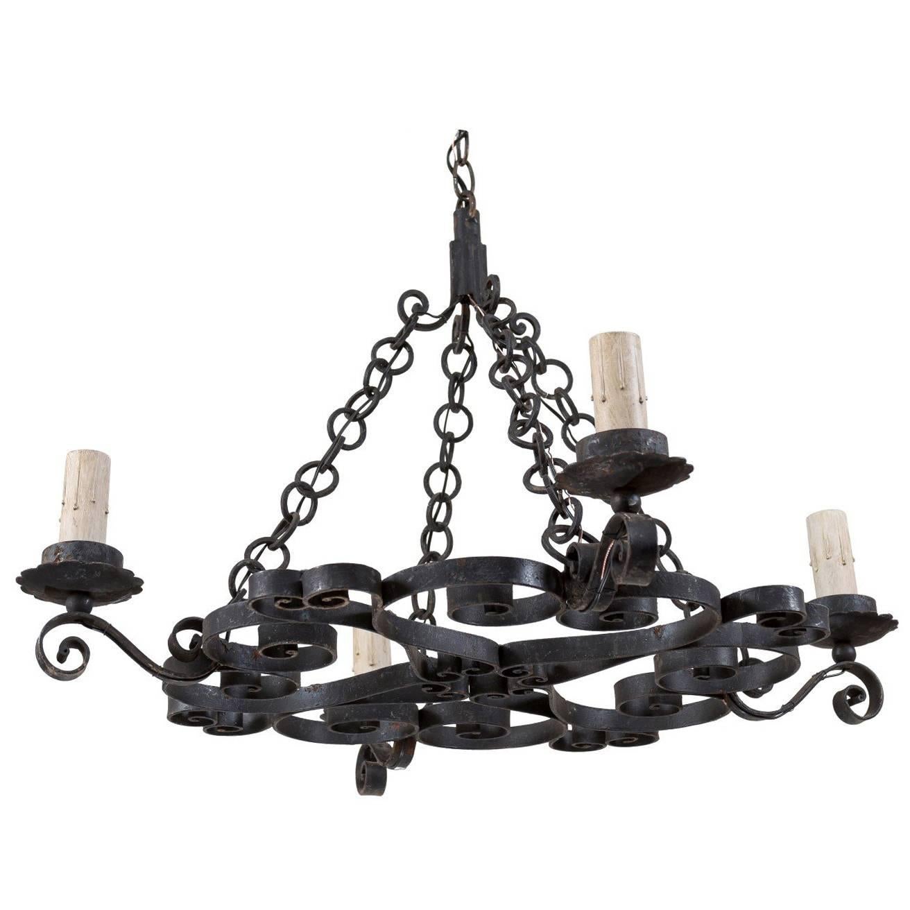French Mid-20th Century Nicely Scrolled Four-Light Black Iron Chandelier