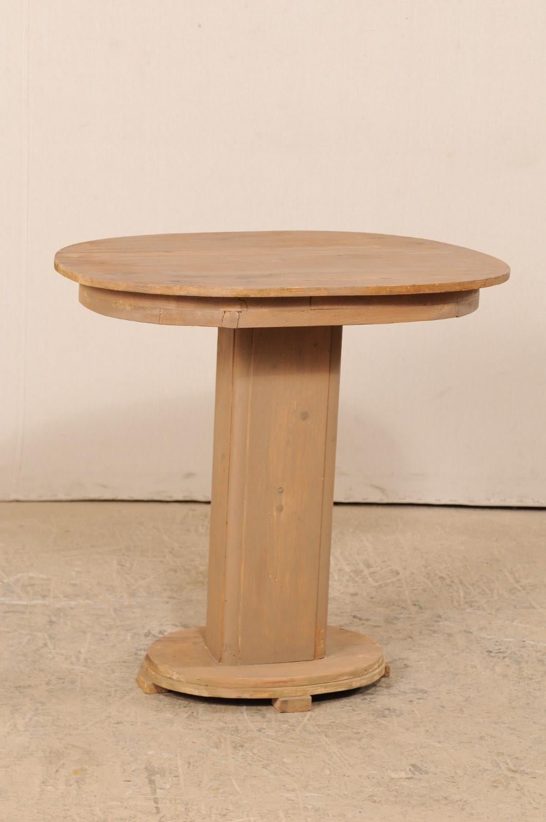 Carved French Mid-20th Century Painted Wood Oval Top Pedestal Table For Sale