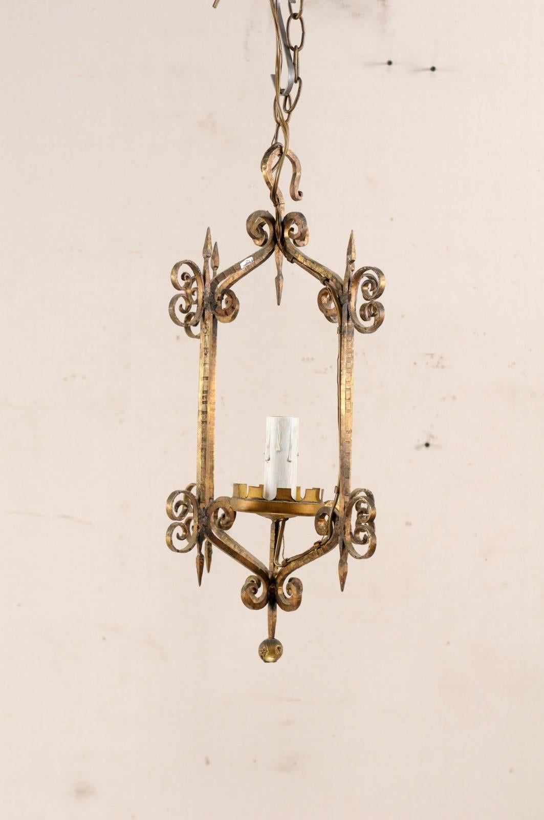 Patinated French Mid-20th Century Single Light Scrolled Iron Chandelier in Gold Bronze Hue For Sale