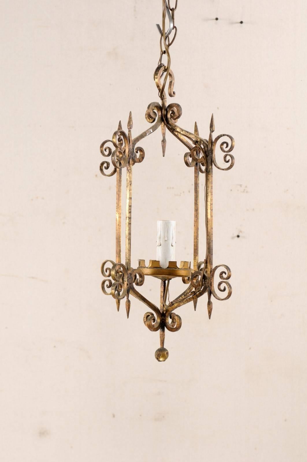 French Mid-20th Century Single Light Scrolled Iron Chandelier in Gold Bronze Hue In Good Condition For Sale In Atlanta, GA