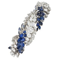 Brazalete francés de mediados de siglo con zafiro, diamante y platino de 51,70 quilates de torsión vintage
