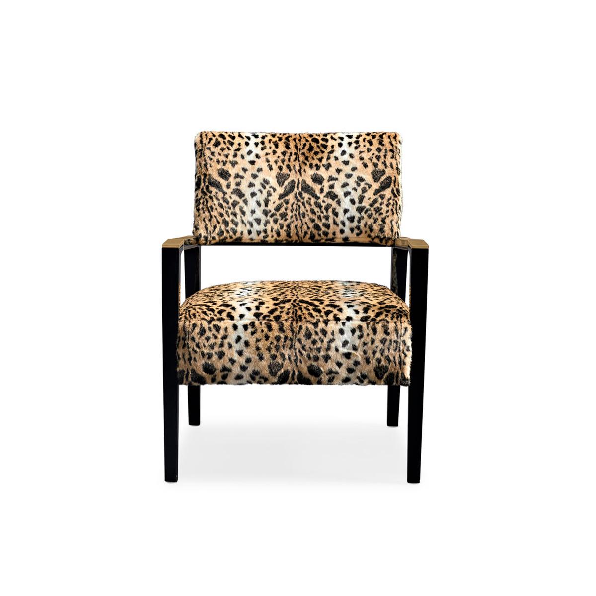 Dressed in an exotic faux leopard fur, its angular mid-century French-inspired frame features a Laque Noire finish with brilliant gold accents that highlight the arms. The back gently curves adding comfort and a seductive element to the already