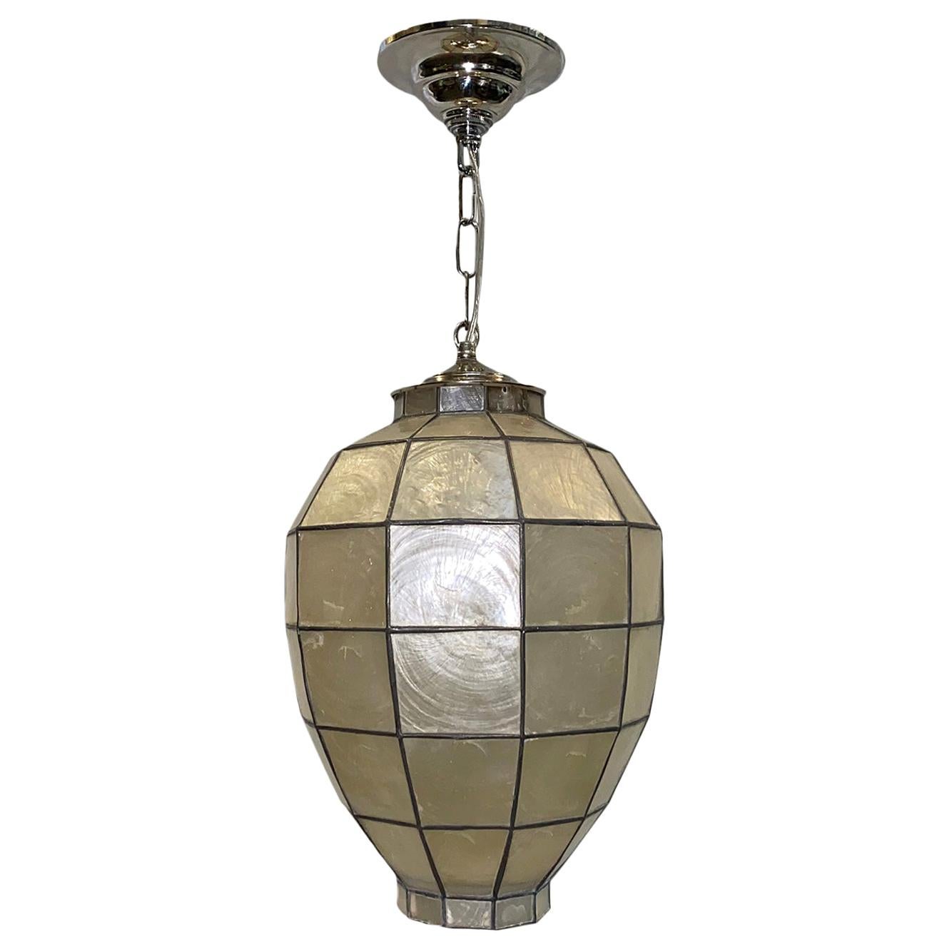 A French circa 1960s nickel-plated and capiz lantern with one Edison interior light.

Measurements:
Height of body: 15