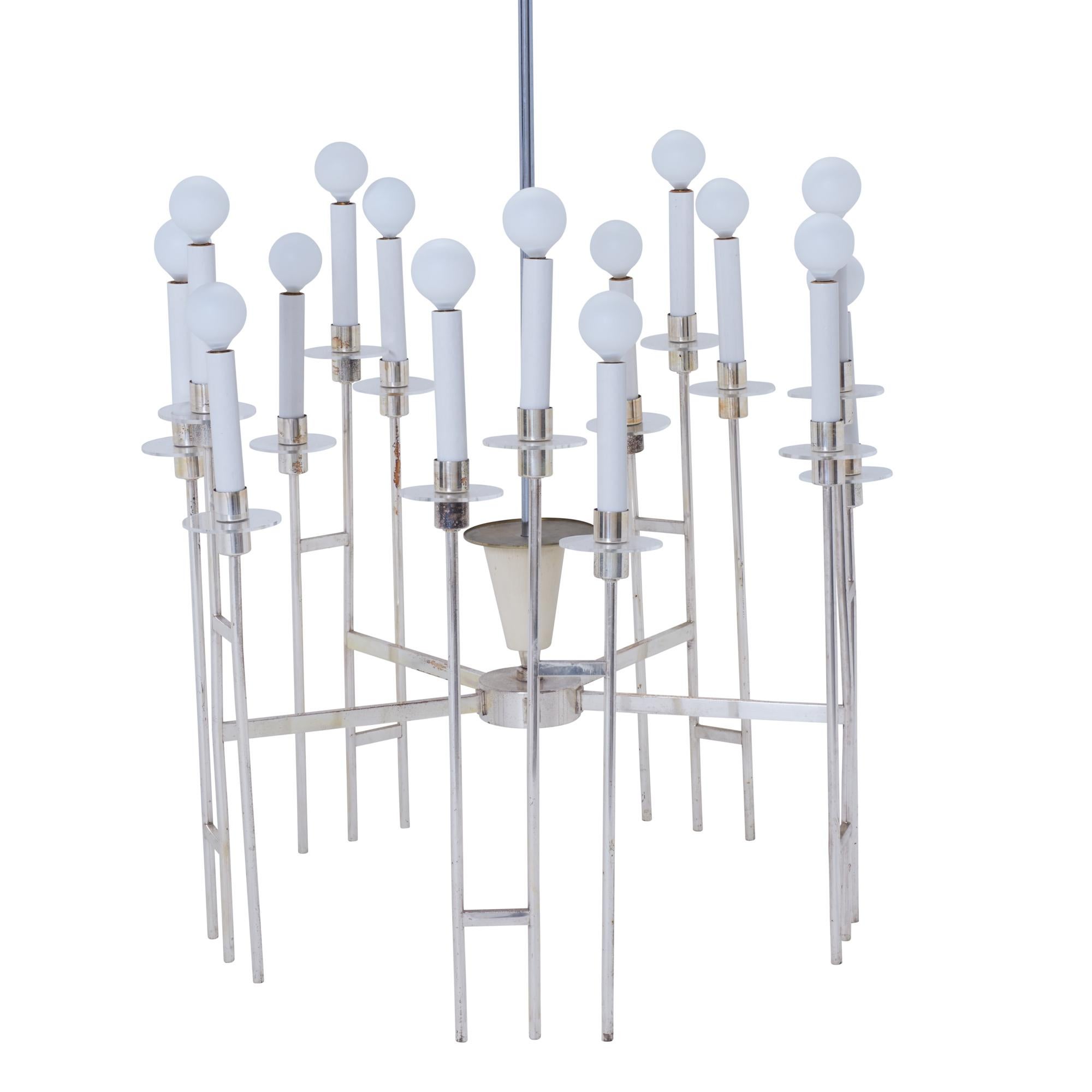 This French midcentury chandelier will surely brighten any room with its lovely chrome and candle-inspired light sockets.

Since Schumacher was founded in 1889, our family-owned company has been synonymous with style, taste, and innovation. A