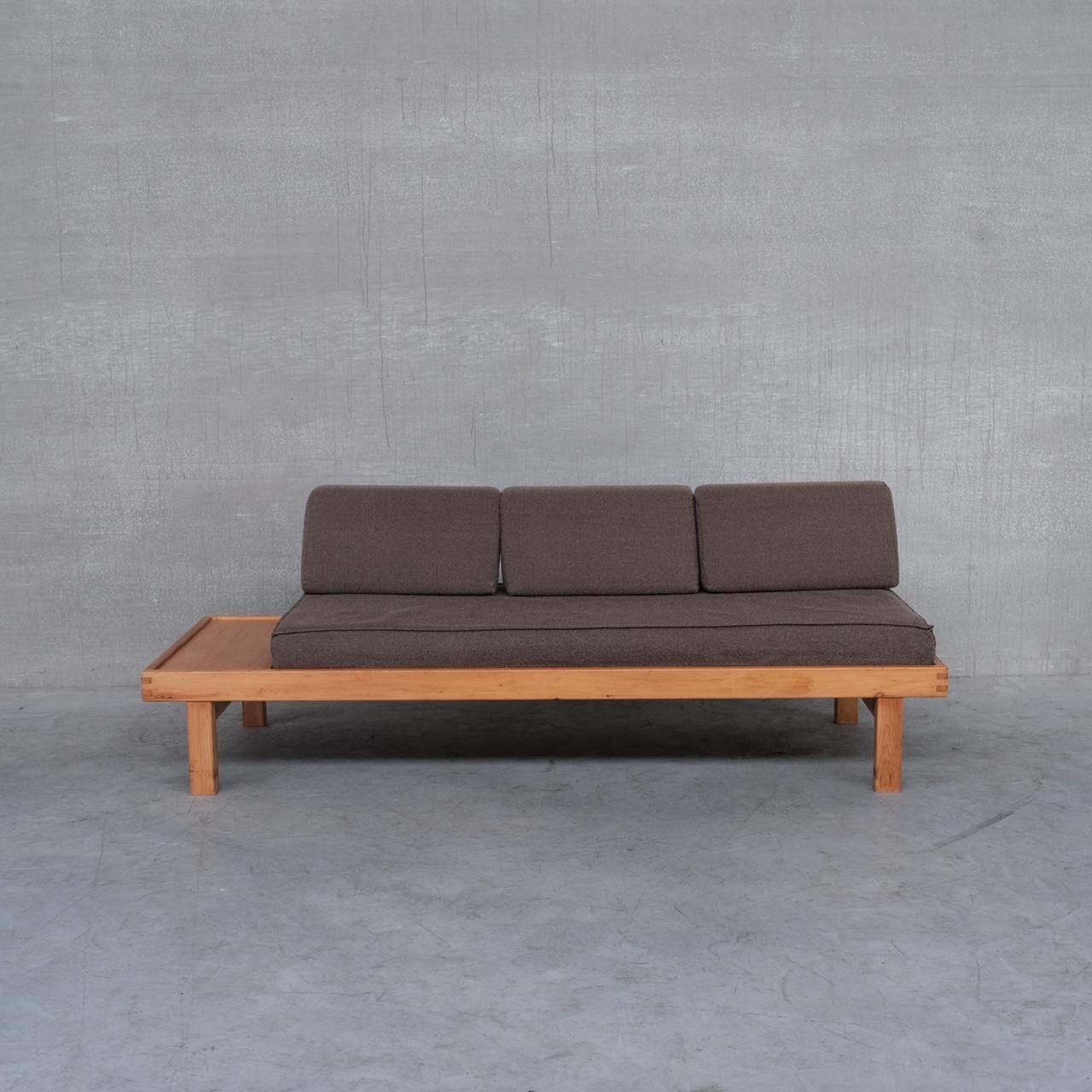 A pine mid-century day bed attributed to Christian Durupt for Meribel Ski station. 

France, c1960s. 

Upholstery looks to be original, it remains in good condition but could easily be updated. 

Good condition, some scuffs and wear
