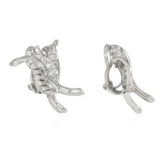 French Mid-Century Diamond and Platinum Clip Earrings of Overlapping Leaf Design