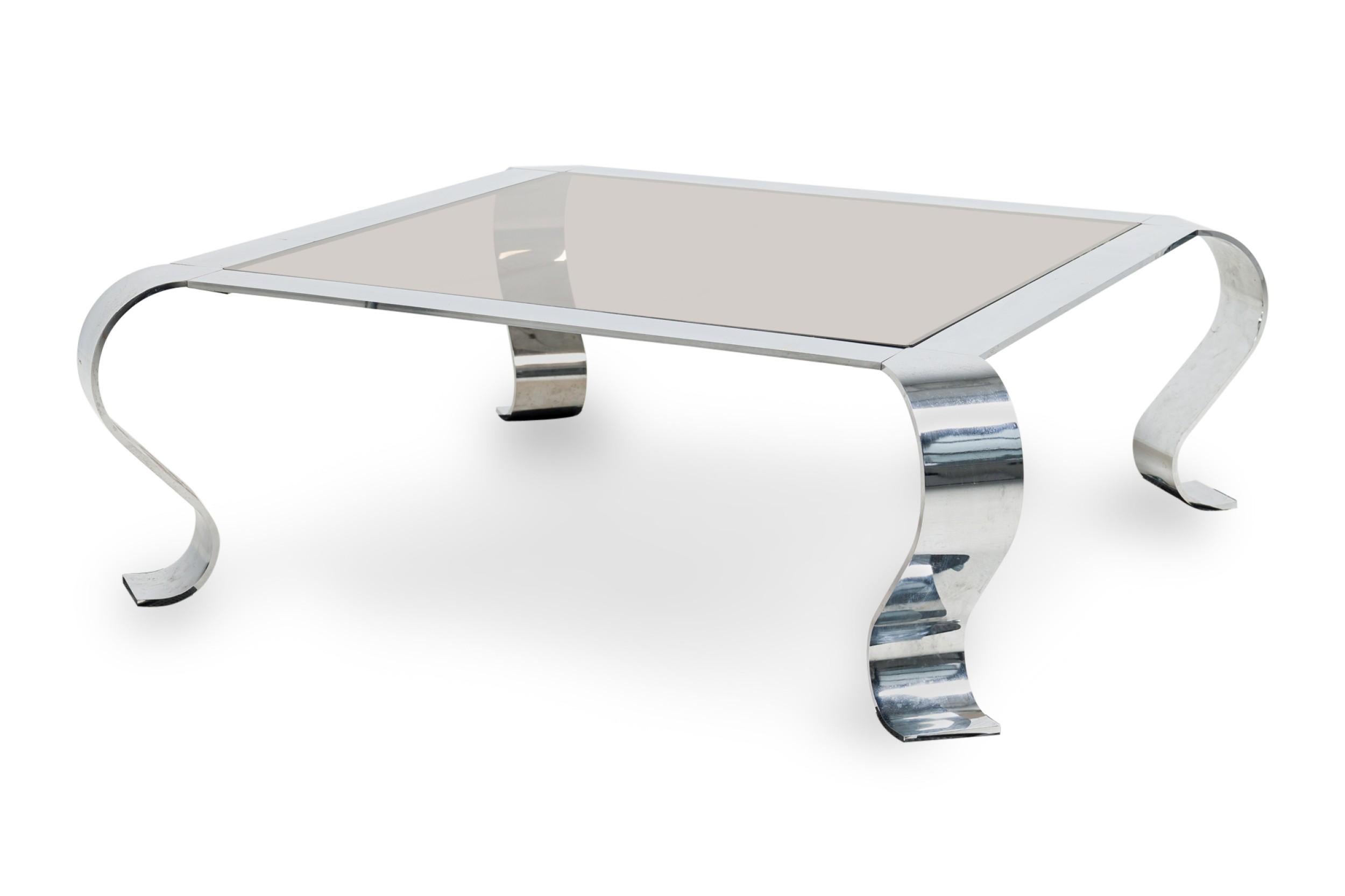 French Mid-Century chrome coffee table with a square inset glass top that lays in the center of the table resting on exagerated cabriole legs (FRANCOIS MONNET)
 

 Condition Notes: